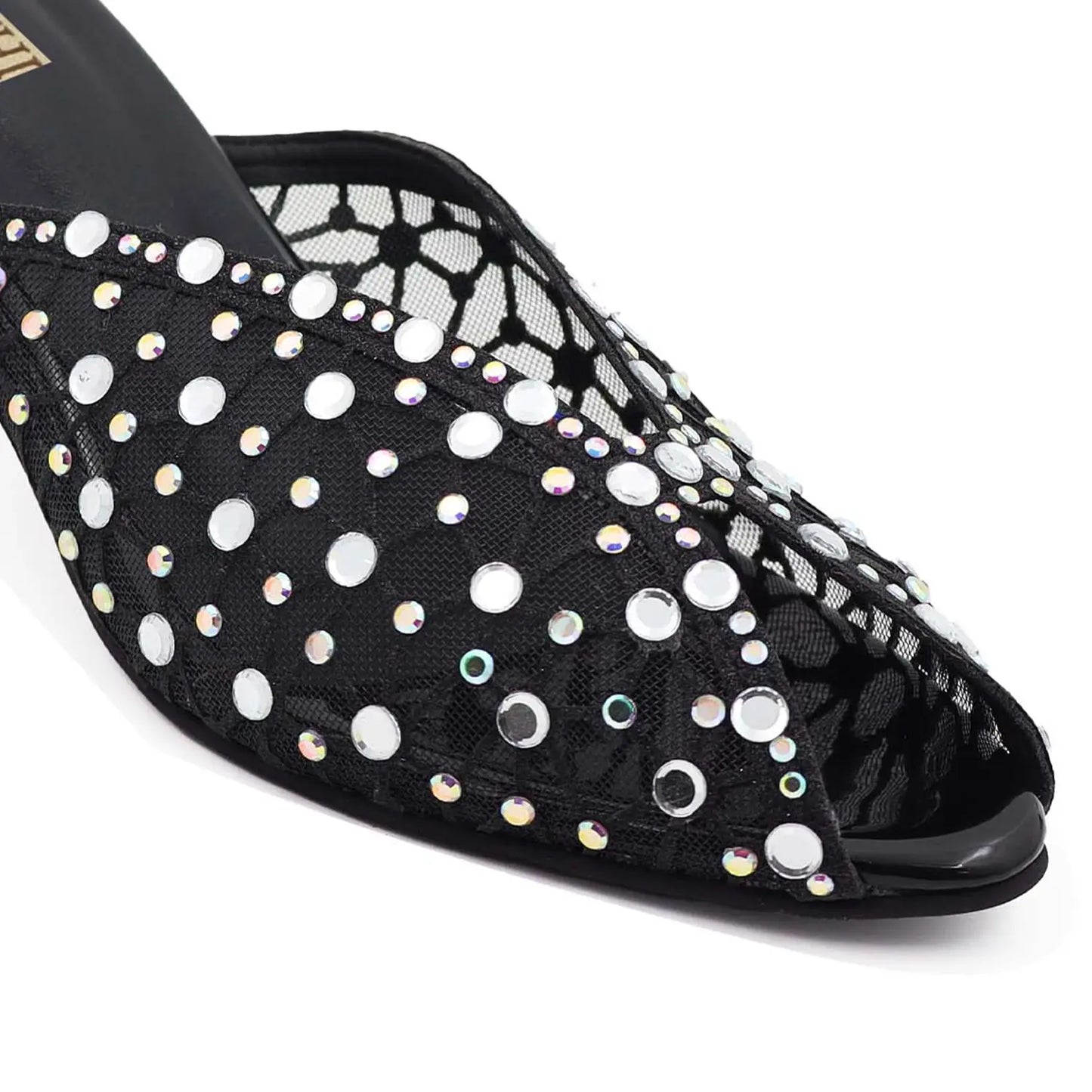 Close-up of black mesh mule with crystal embellishments