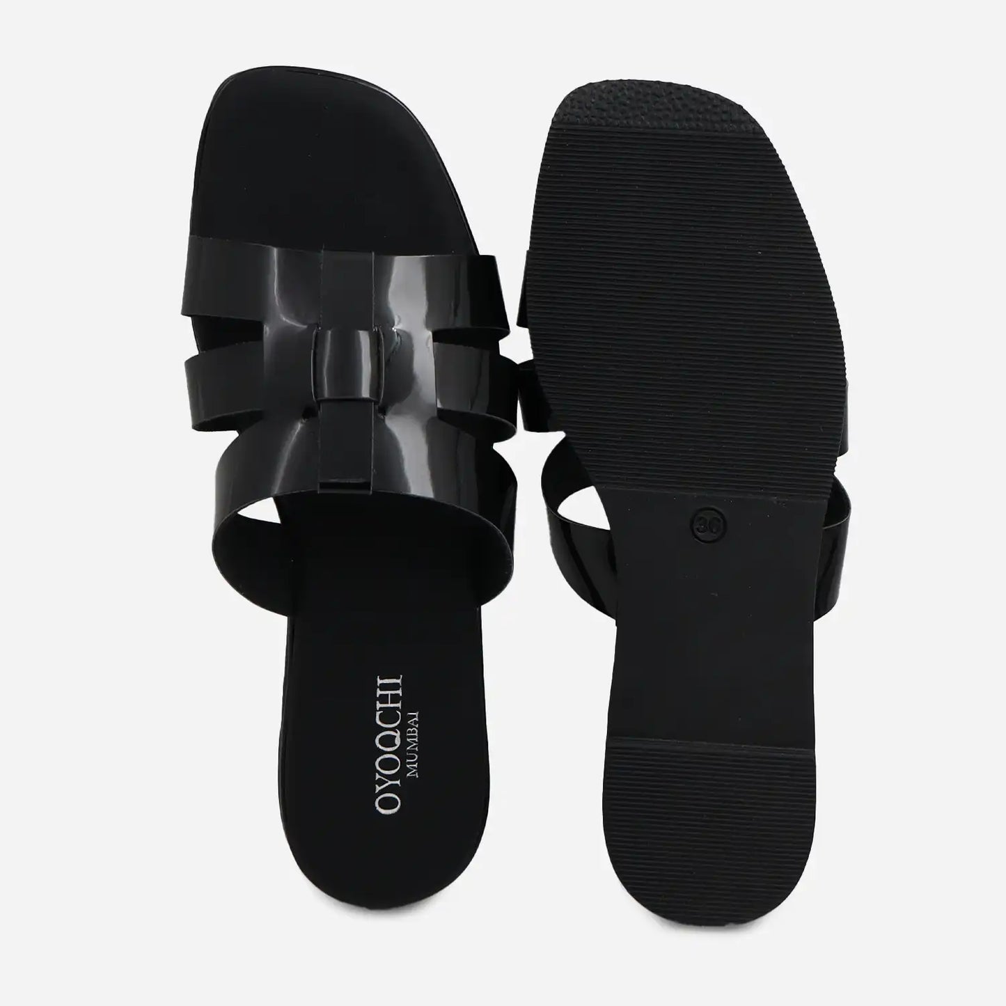 Women's black flat sandals top and sole view.