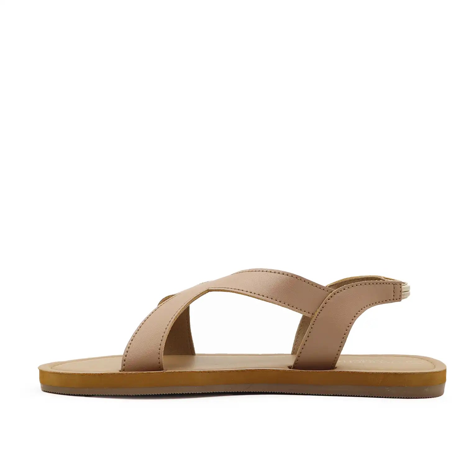 A pair of women's minimalist flat sandals with crisscrossing straps and a tan sole, side view
