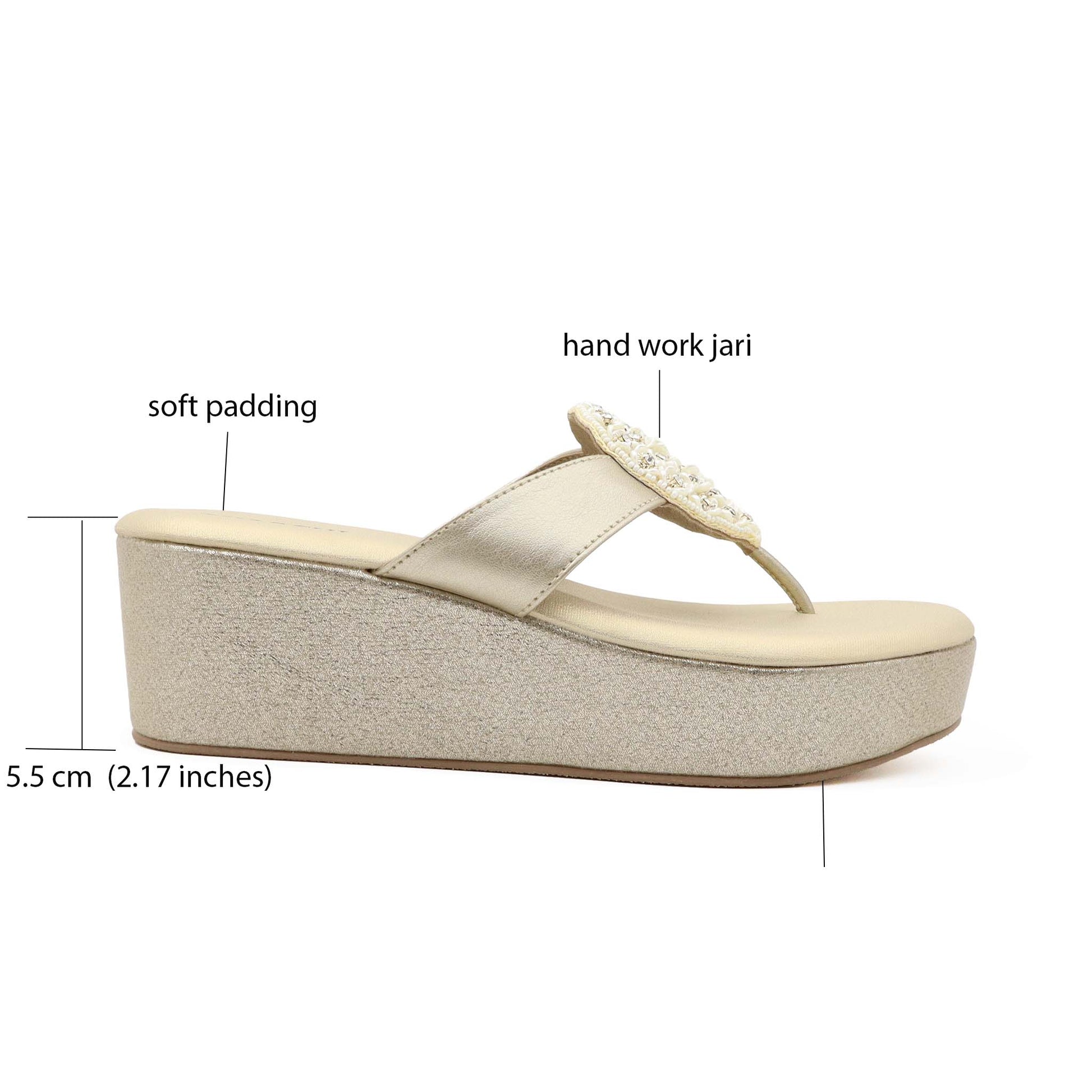 Details view of gold comfort platform heels for women