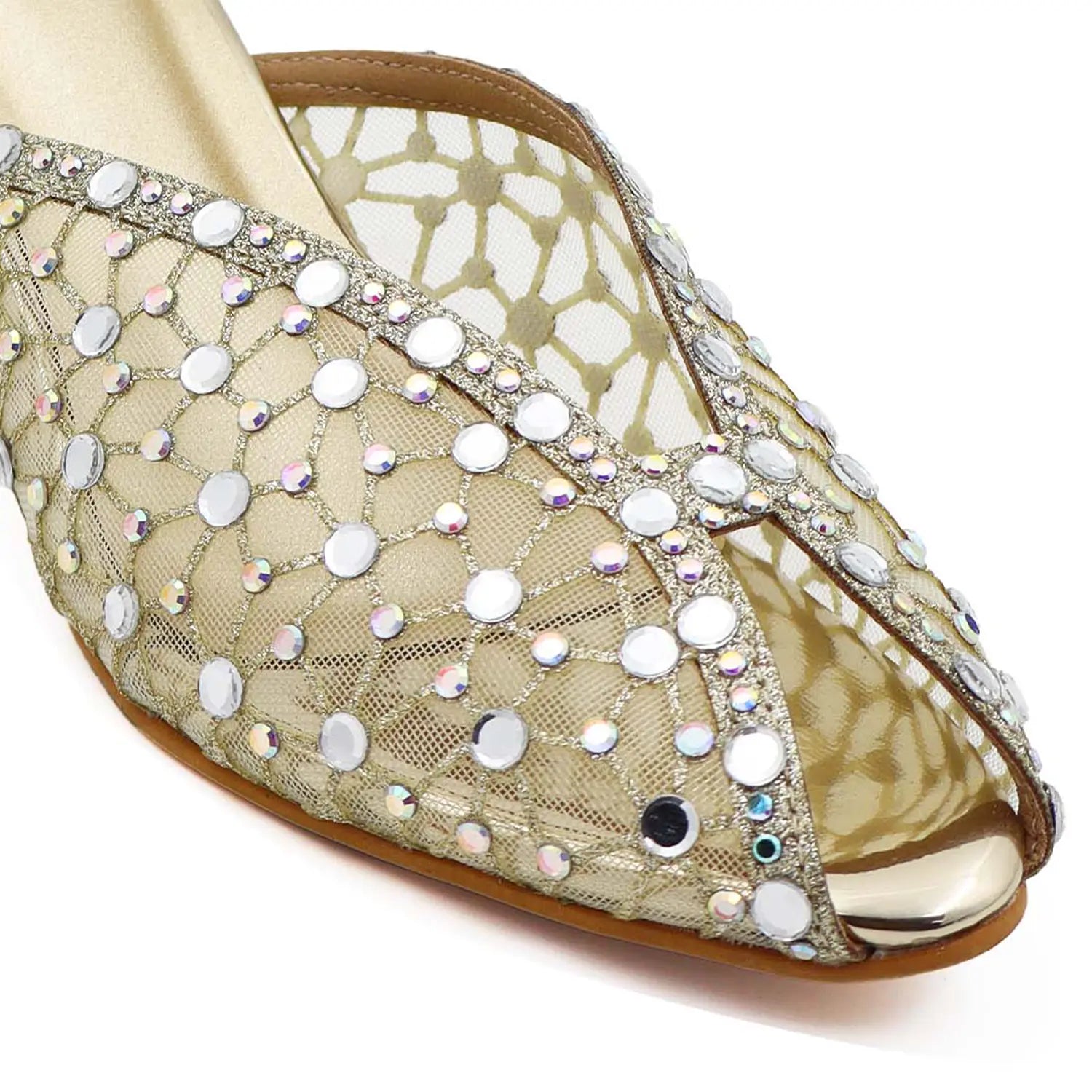 Close-up of gold mesh mule with rhinestone detailing
