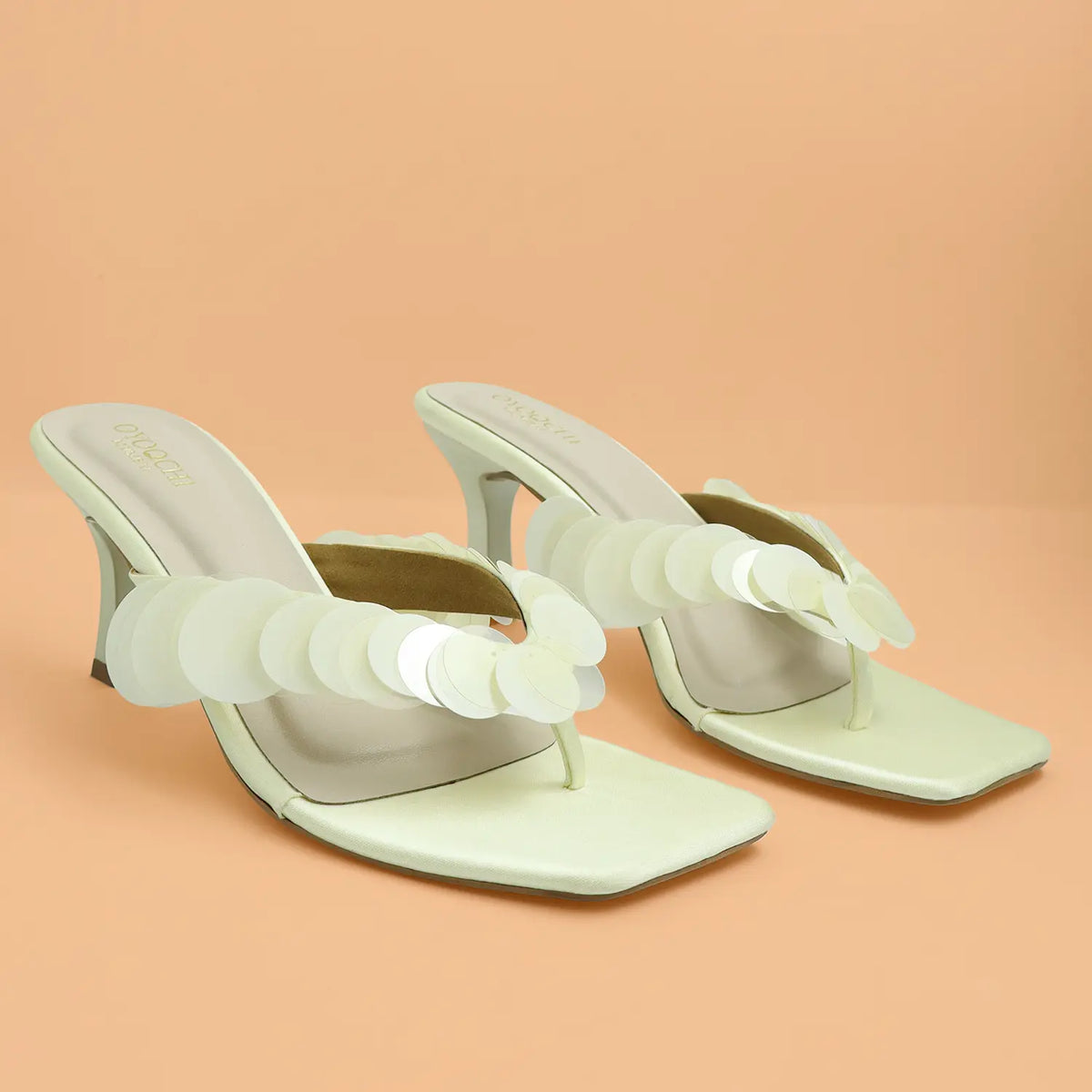 Ivory Disc Heels