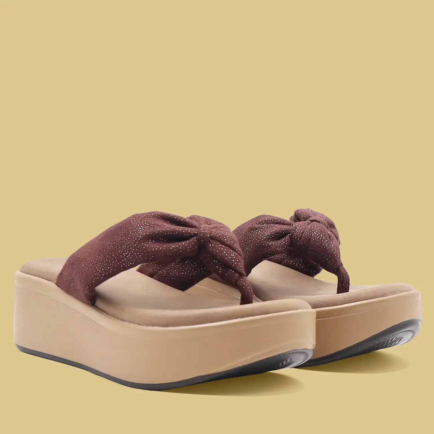 Women's tan platform wedge sandals pair view.