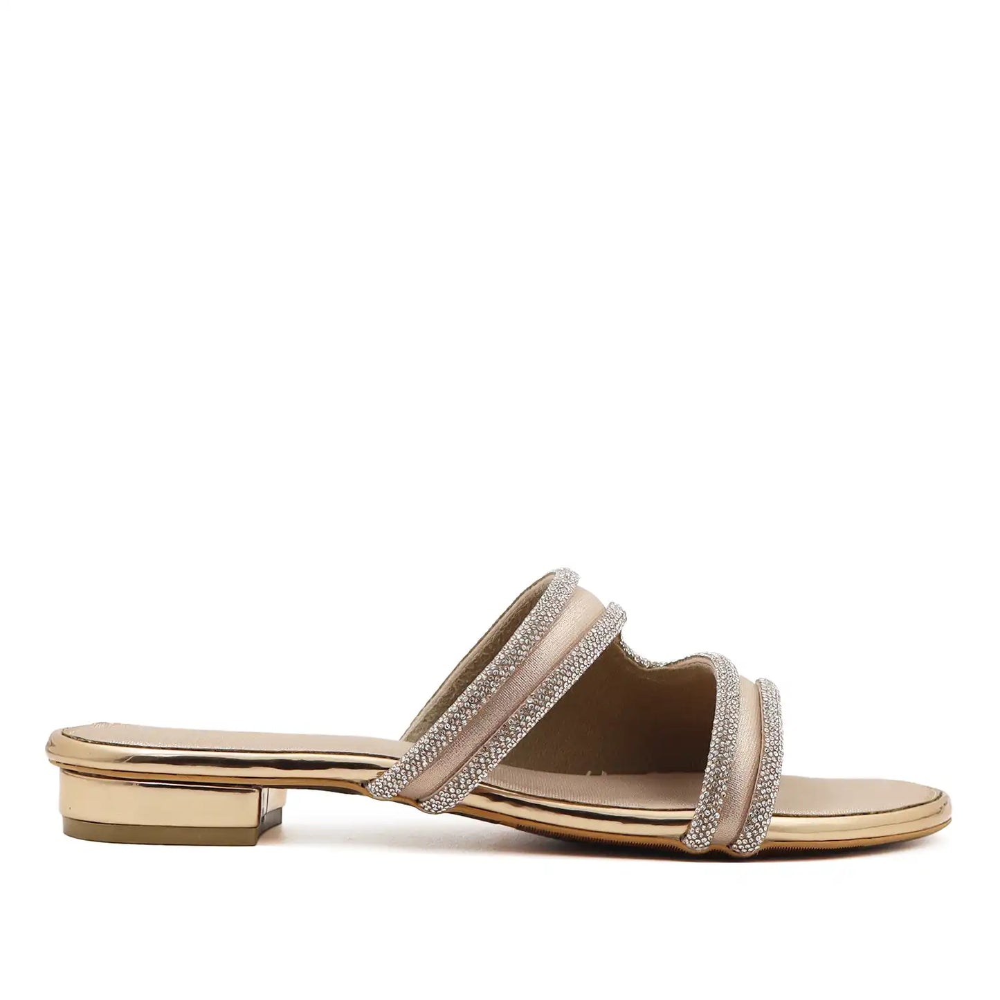Side profile view of women's rose gold embellished flat sandals