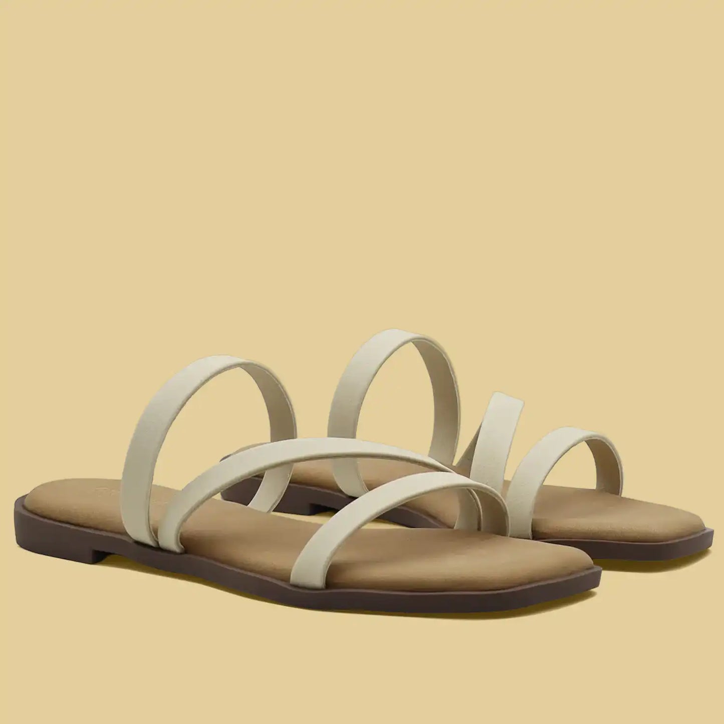Beige multi strap flat sandals for women pair view