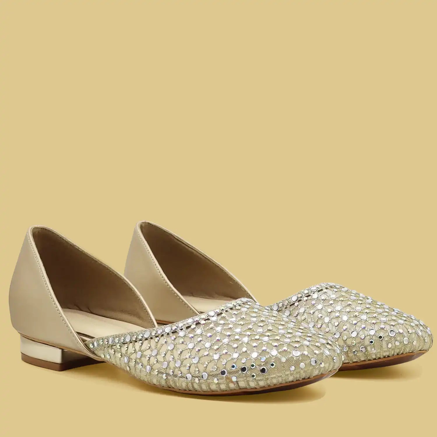 Pair of women’s gold embellished jutti flats with silver sequin detailing