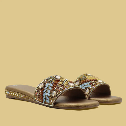 pair of women’s embellished ethnic flat sandals with beaded upper, front angle view