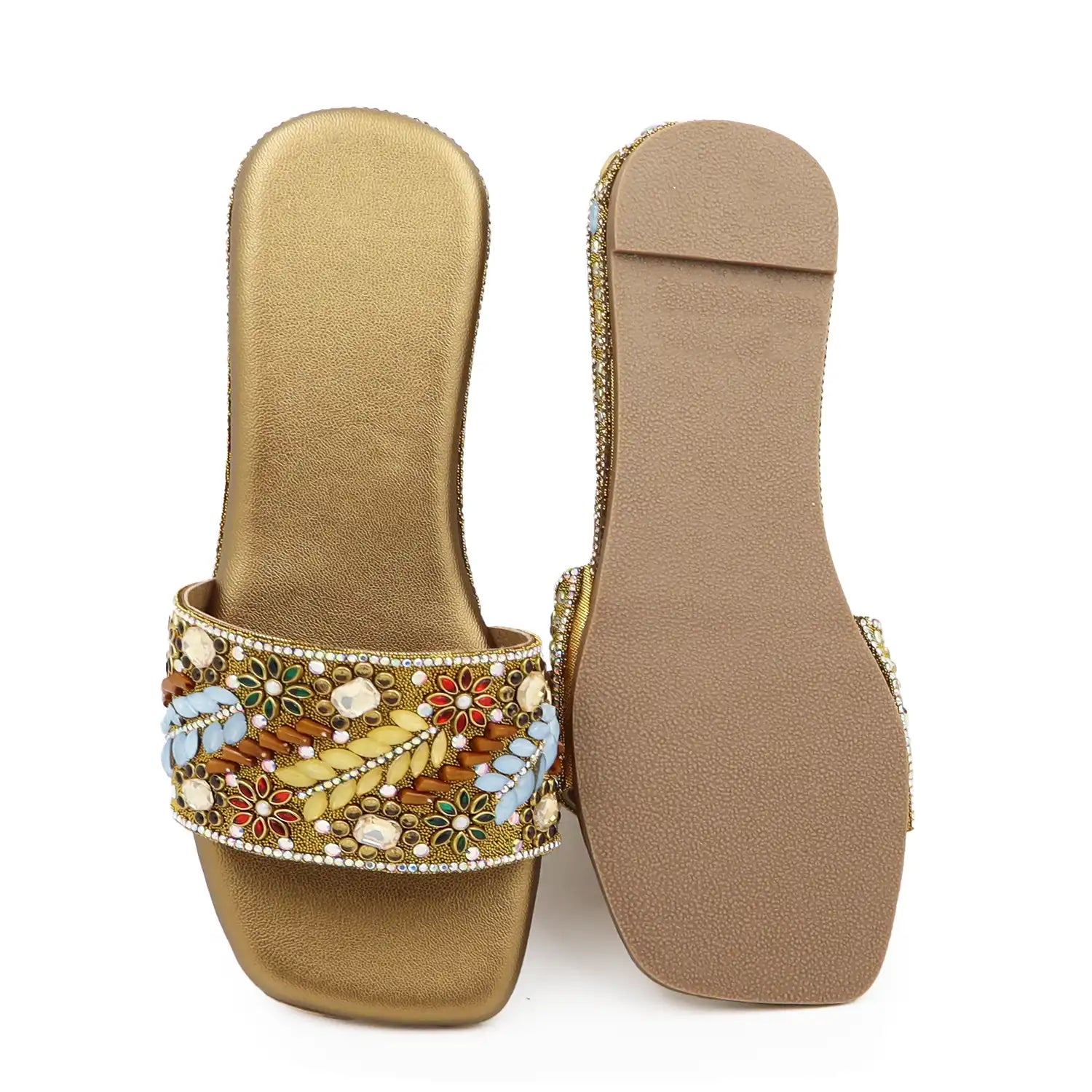 close view of women’s embellished ethnic flat sandal with beaded upper