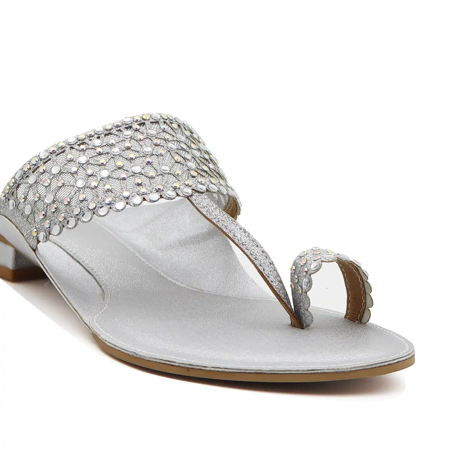 Close view of silver embellished kolhapuri flats