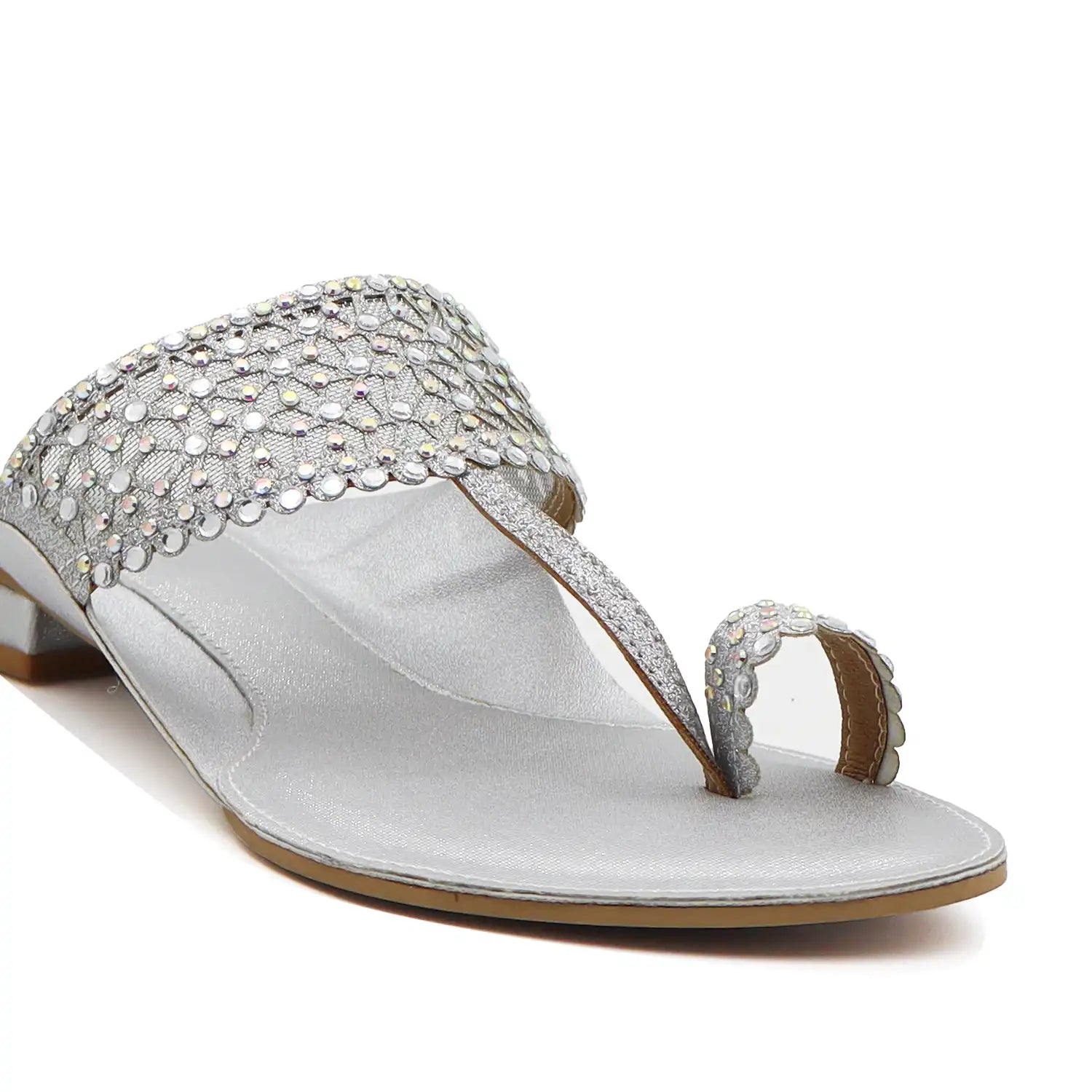 Close view of silver embellished kolhapuri flats