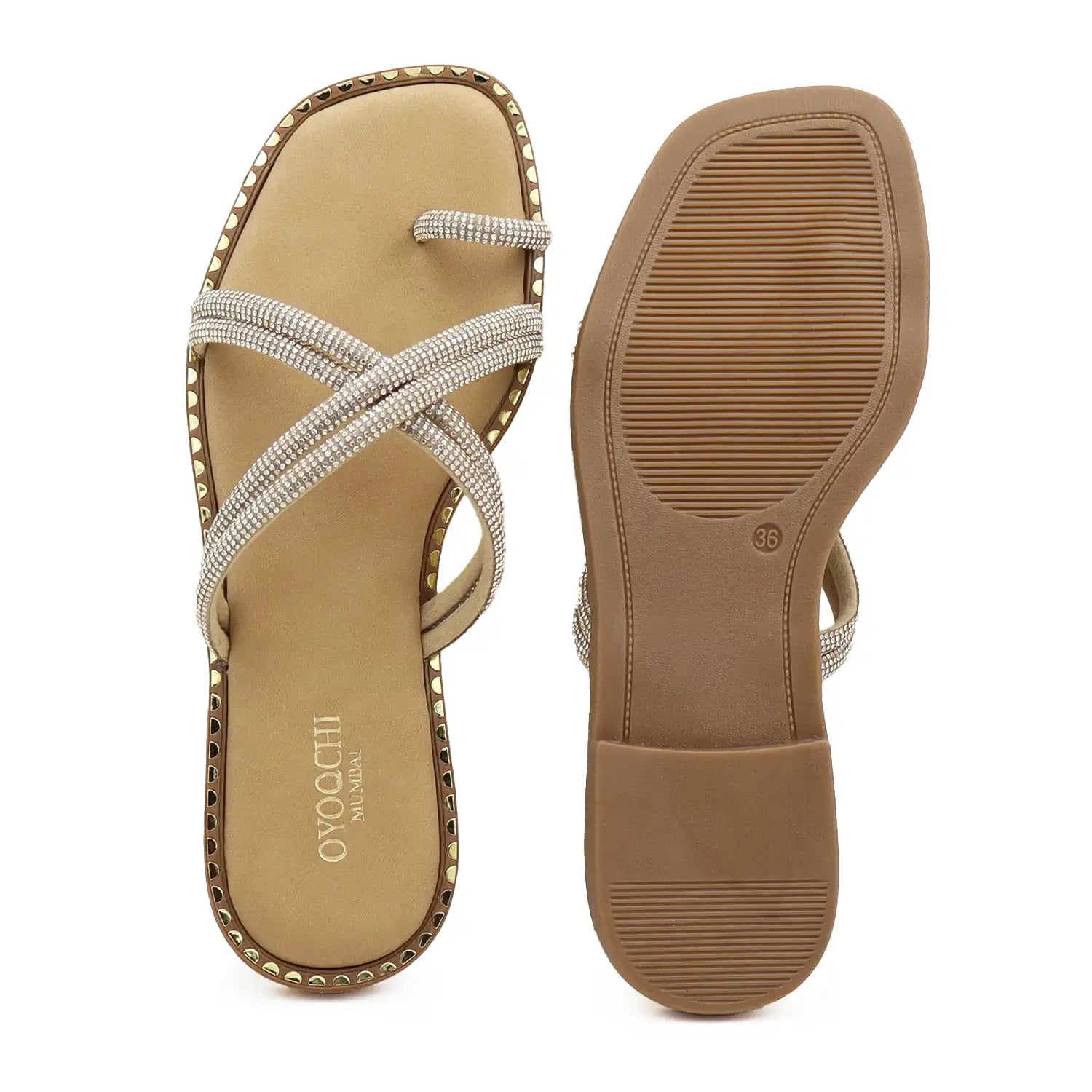 Top and sole view of gold strappy flat sandals for women