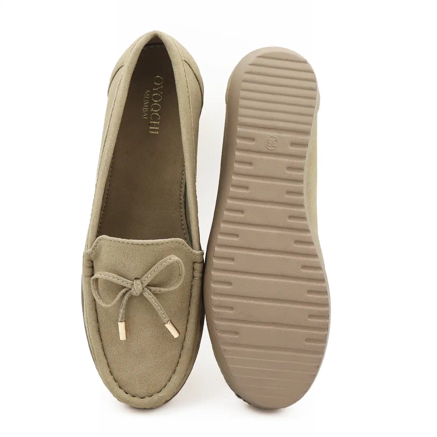 Top and sole view of women's beige wedge heel loafers