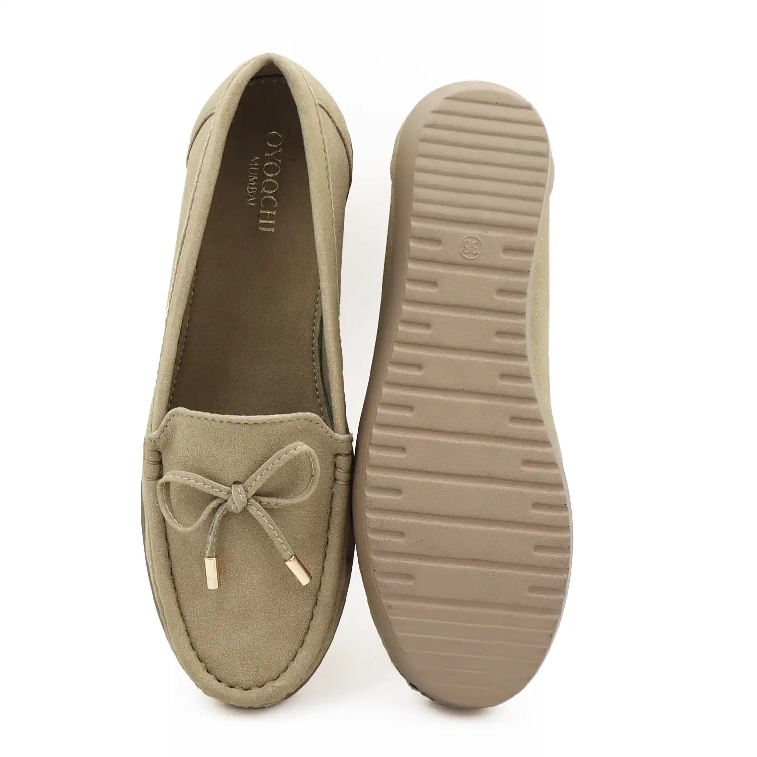 Top and sole view of women's beige wedge heel loafers