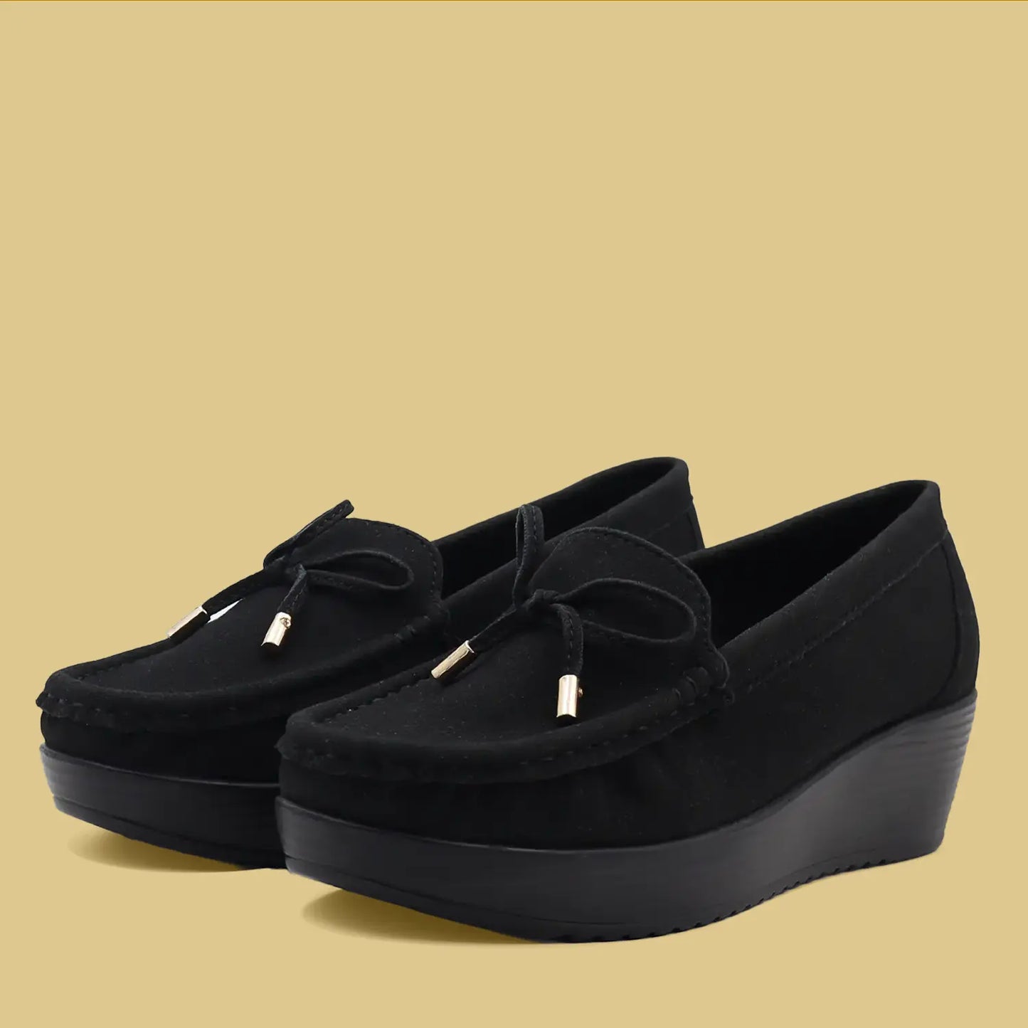 Front view of women's black wedge heel loafers