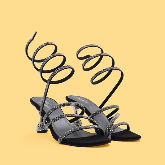 Oyoqchi women's party wear black strappy heels with ankle strap, pair vew