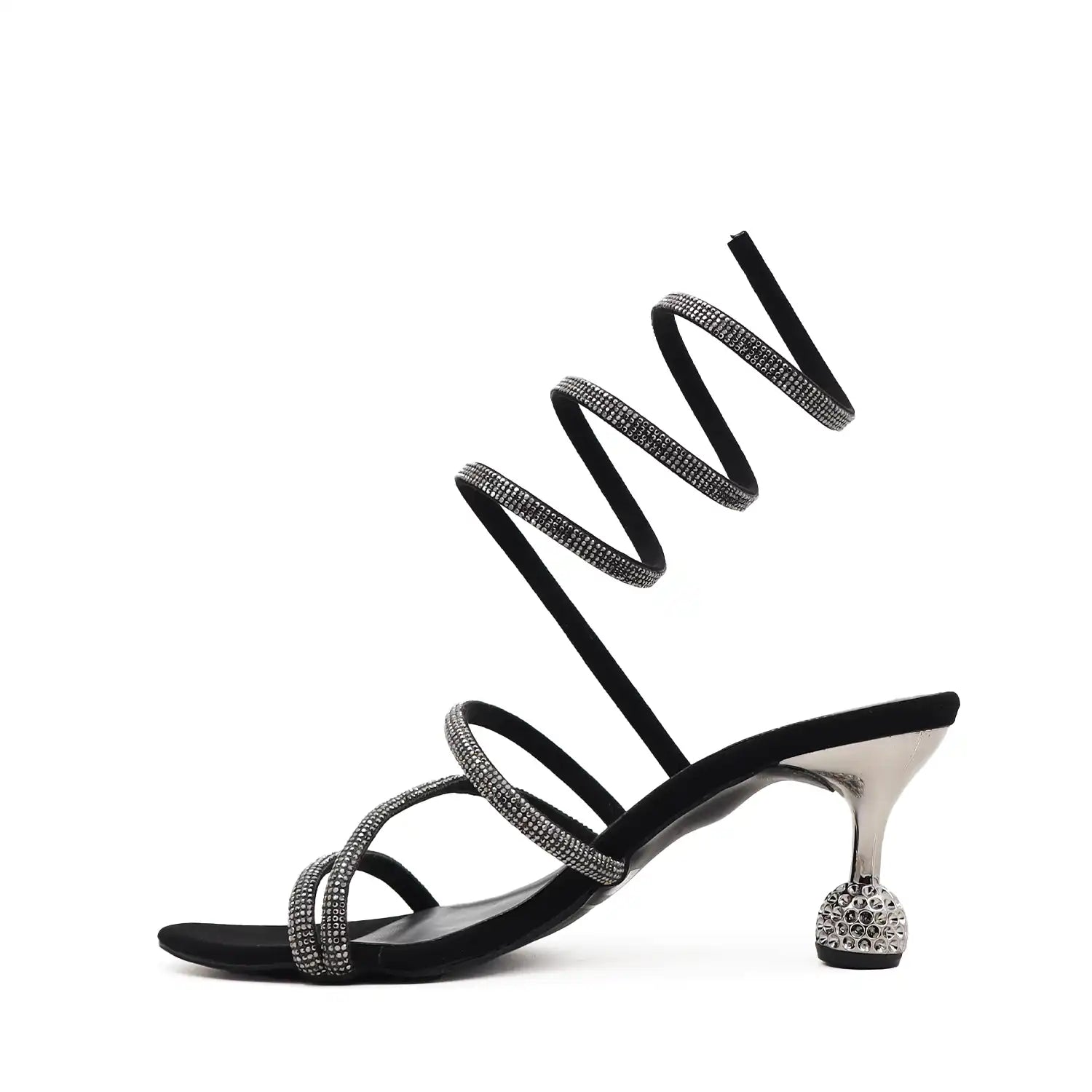 Women's party wear black strappy heels with ankle strap, side profile view