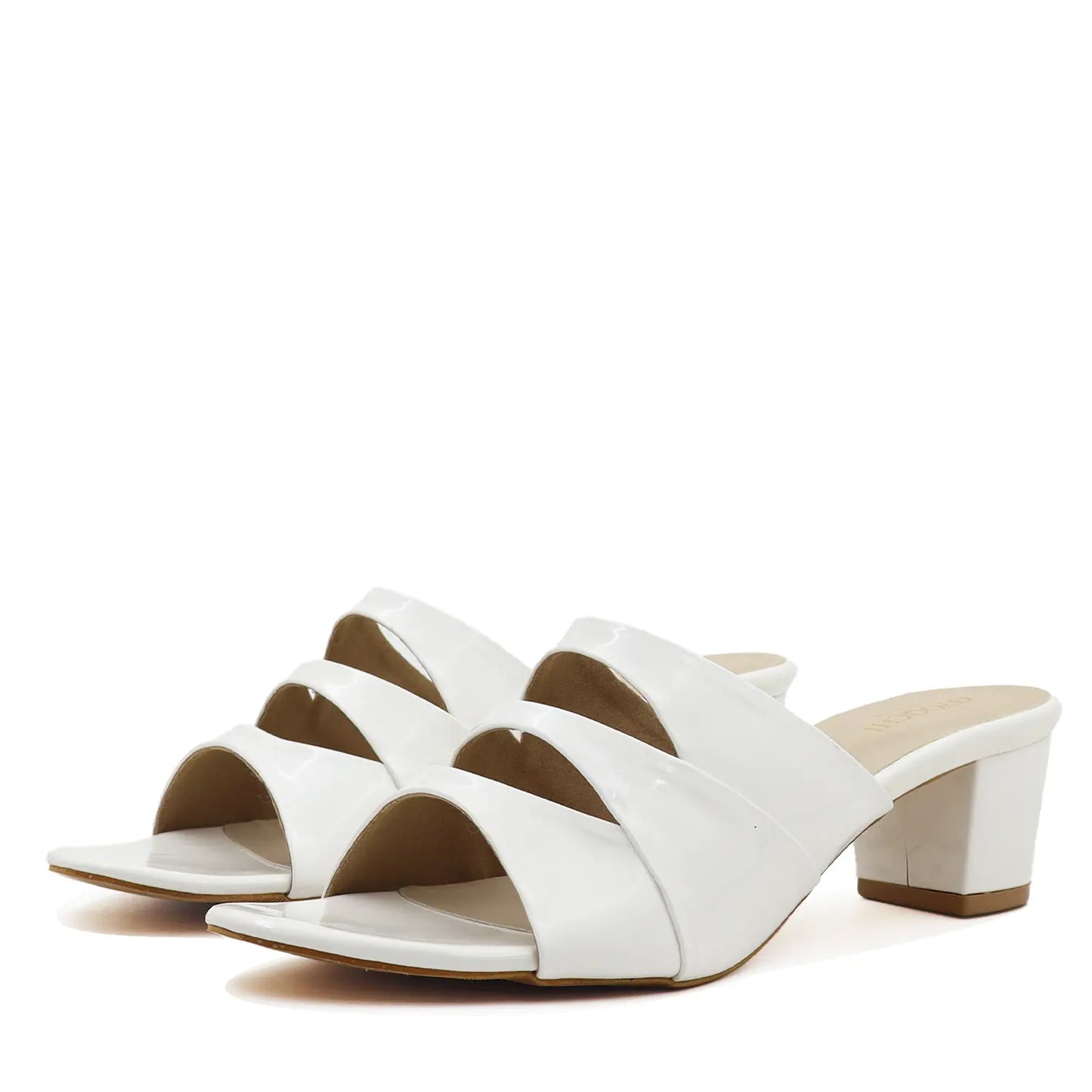 A pair of women's white block heel sandals, angled view