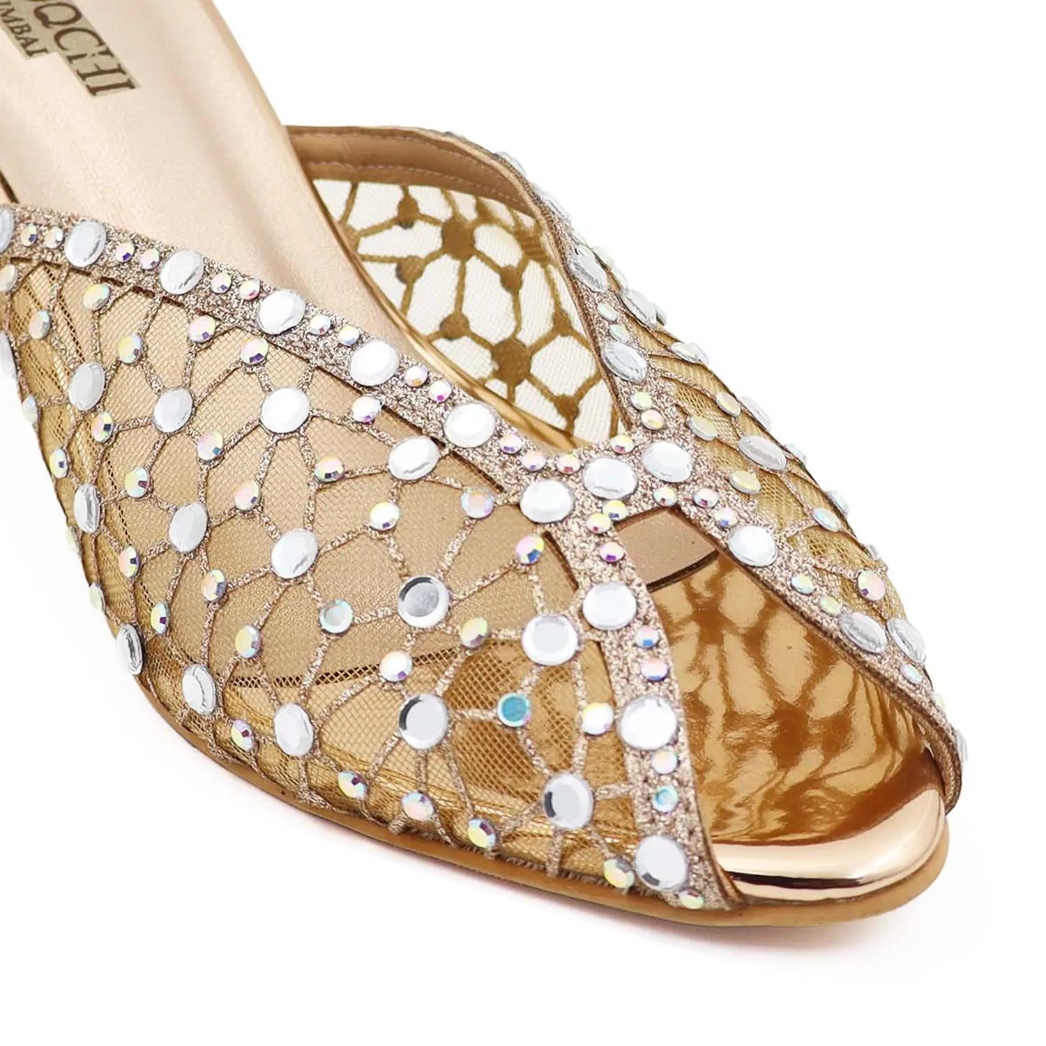 Close-up of rose gold mesh mule with crystal embellishments