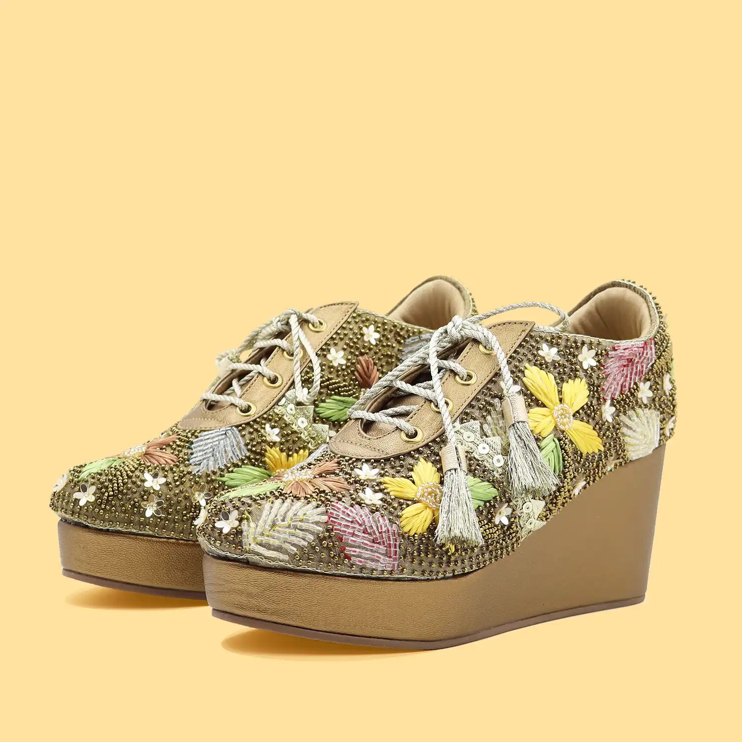 Pair view of women's bridal sneakers with 3 inch heels