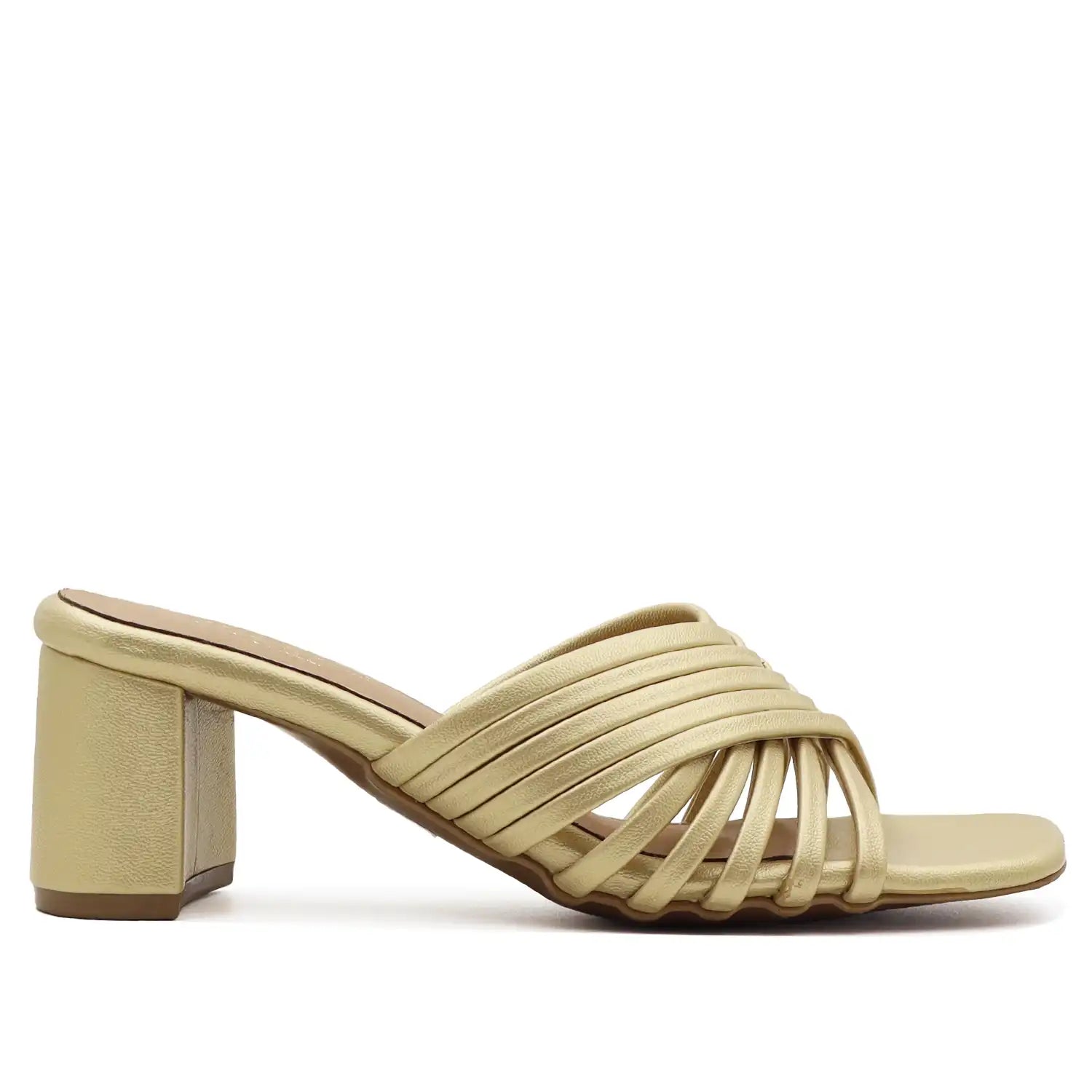 Gold sandal with a block heel side profile view