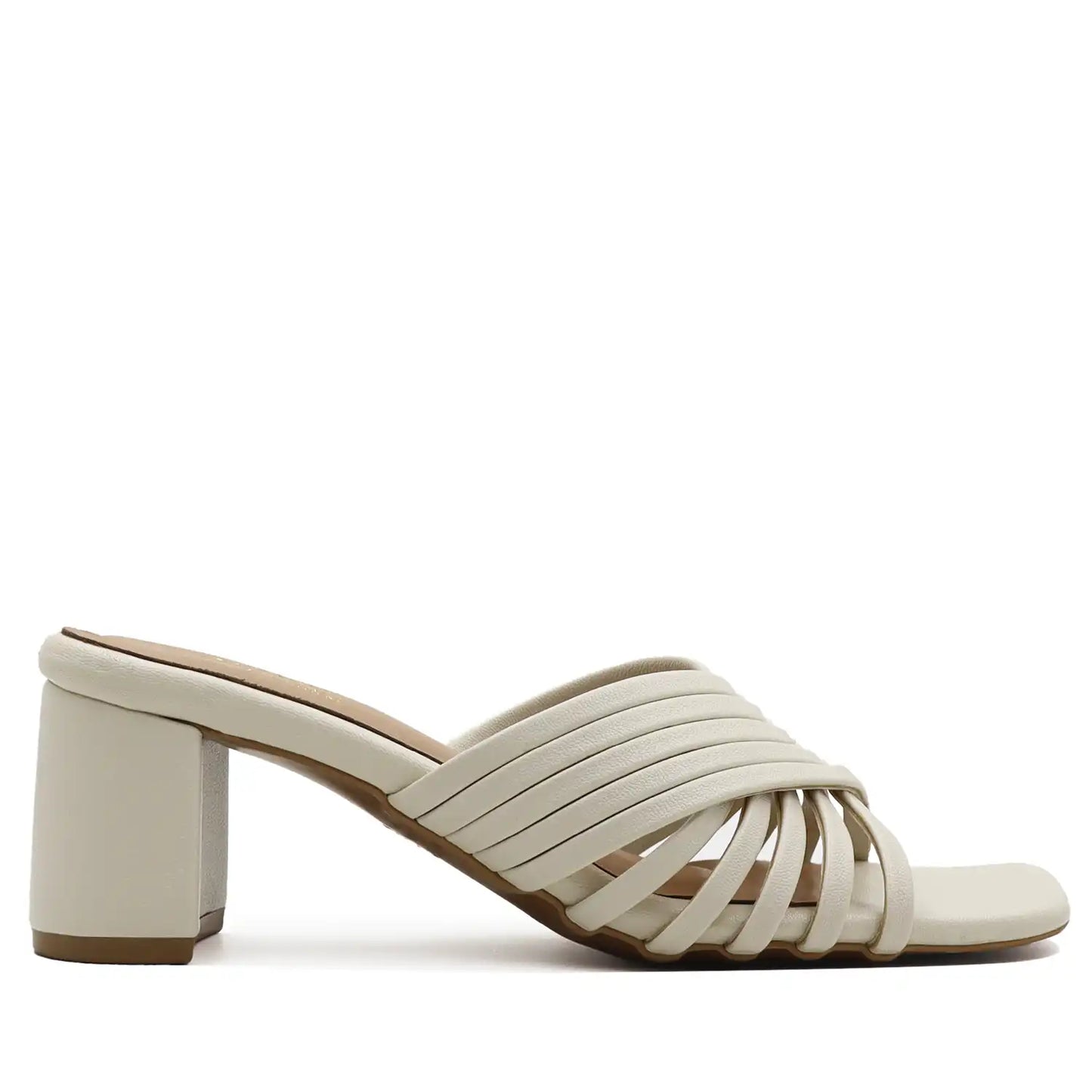 white sandal with a block heel side profile view