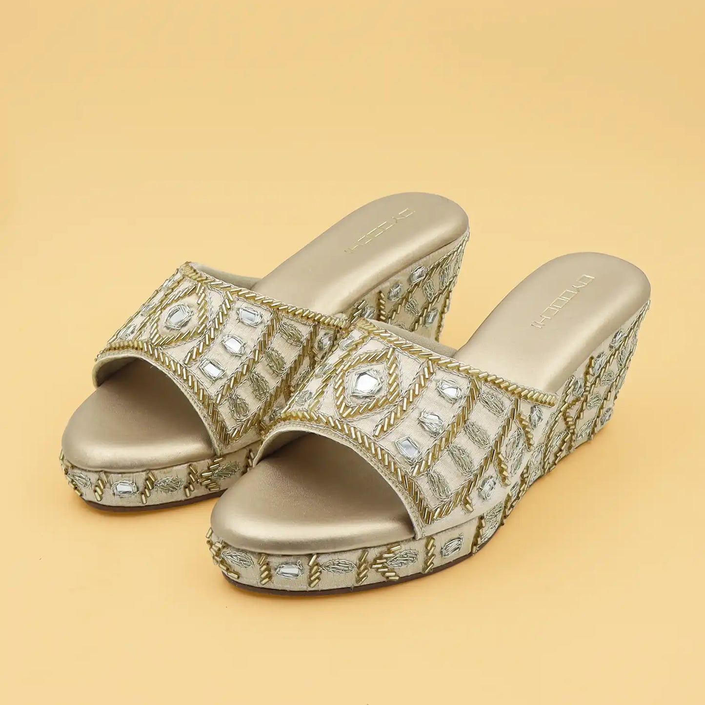 Oyoqchi women's ethnic gold wedge sandals with cushioned sole 