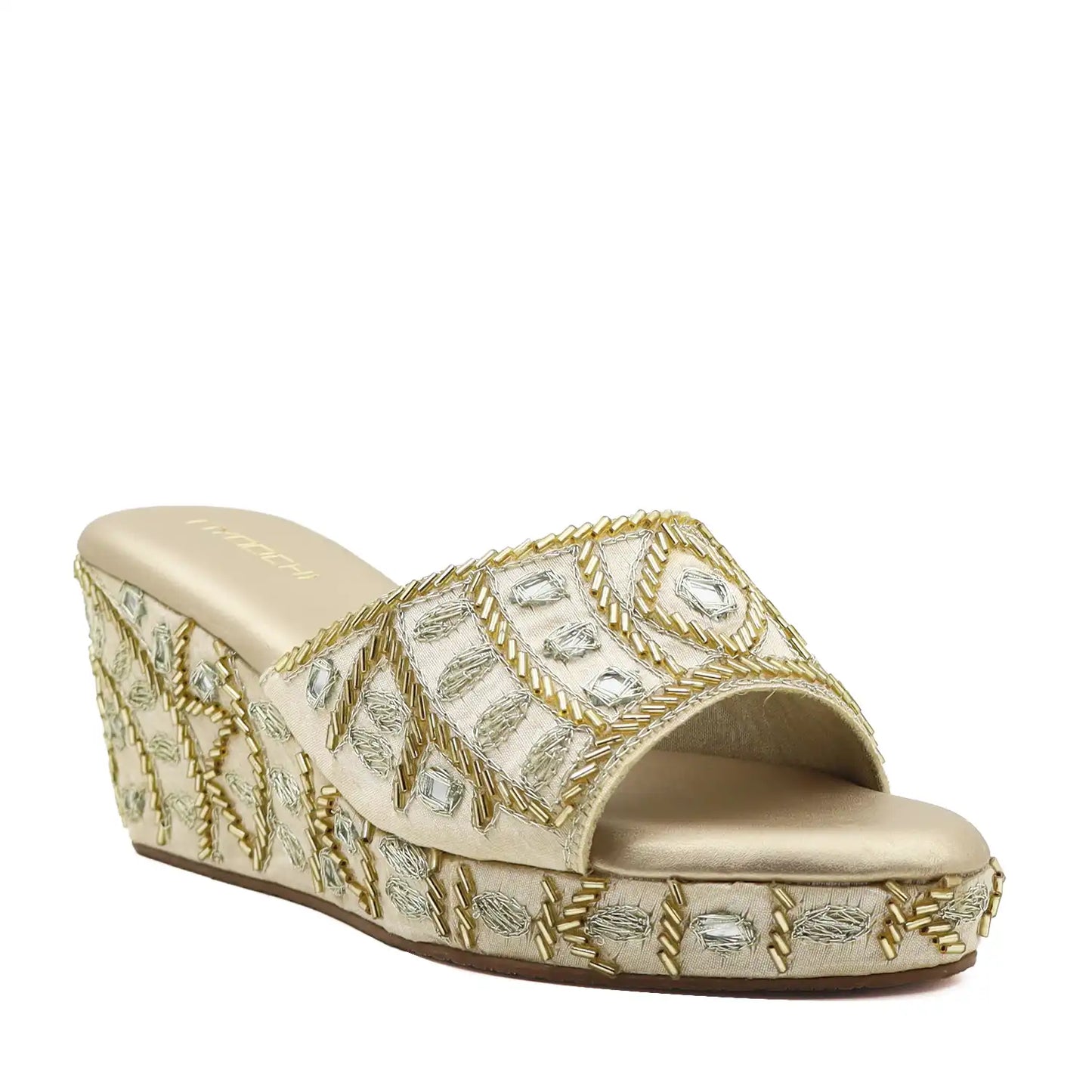 Women's ethnic gold wedge sandals, angled view