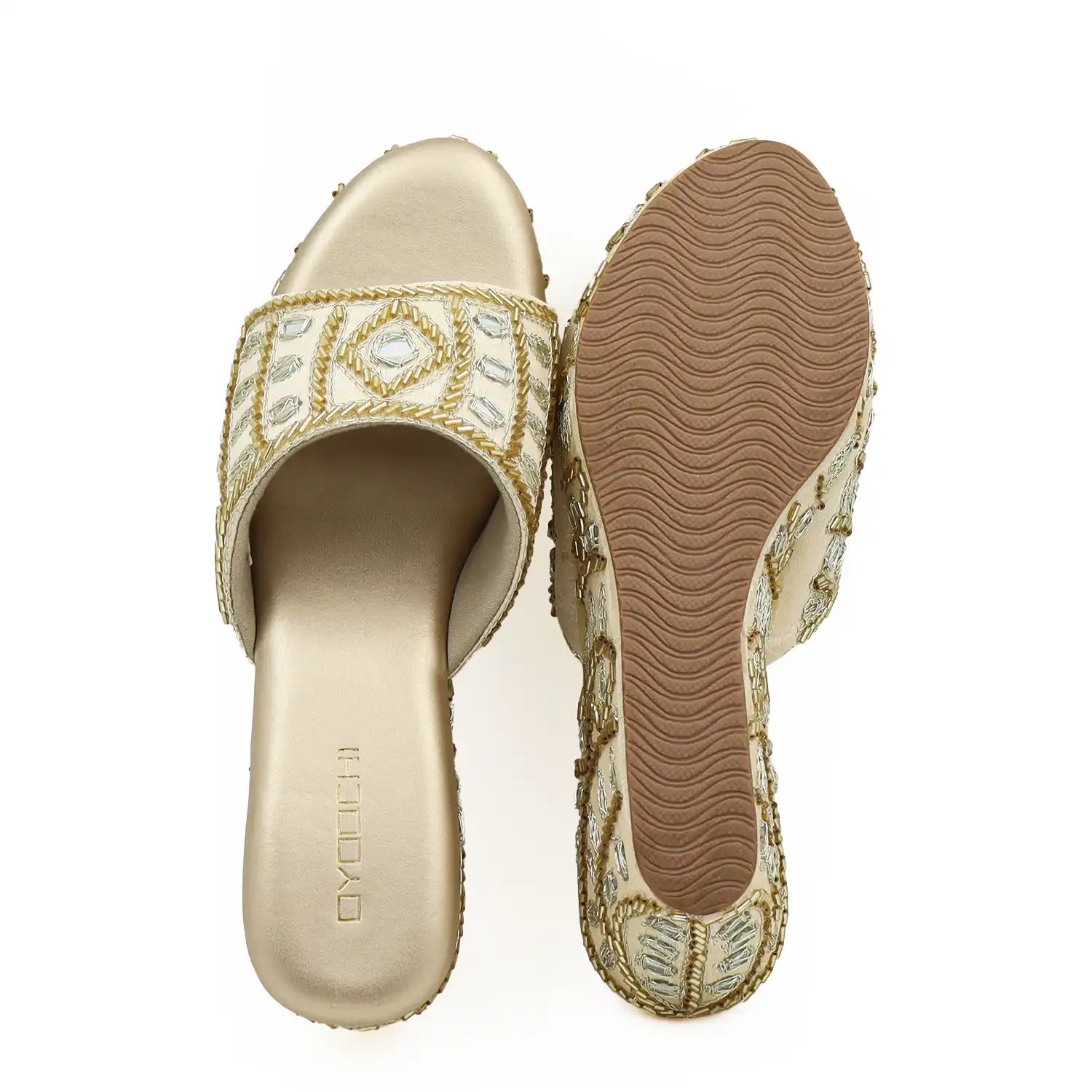 Sole and top view of women's ethnic gold wedge sandals