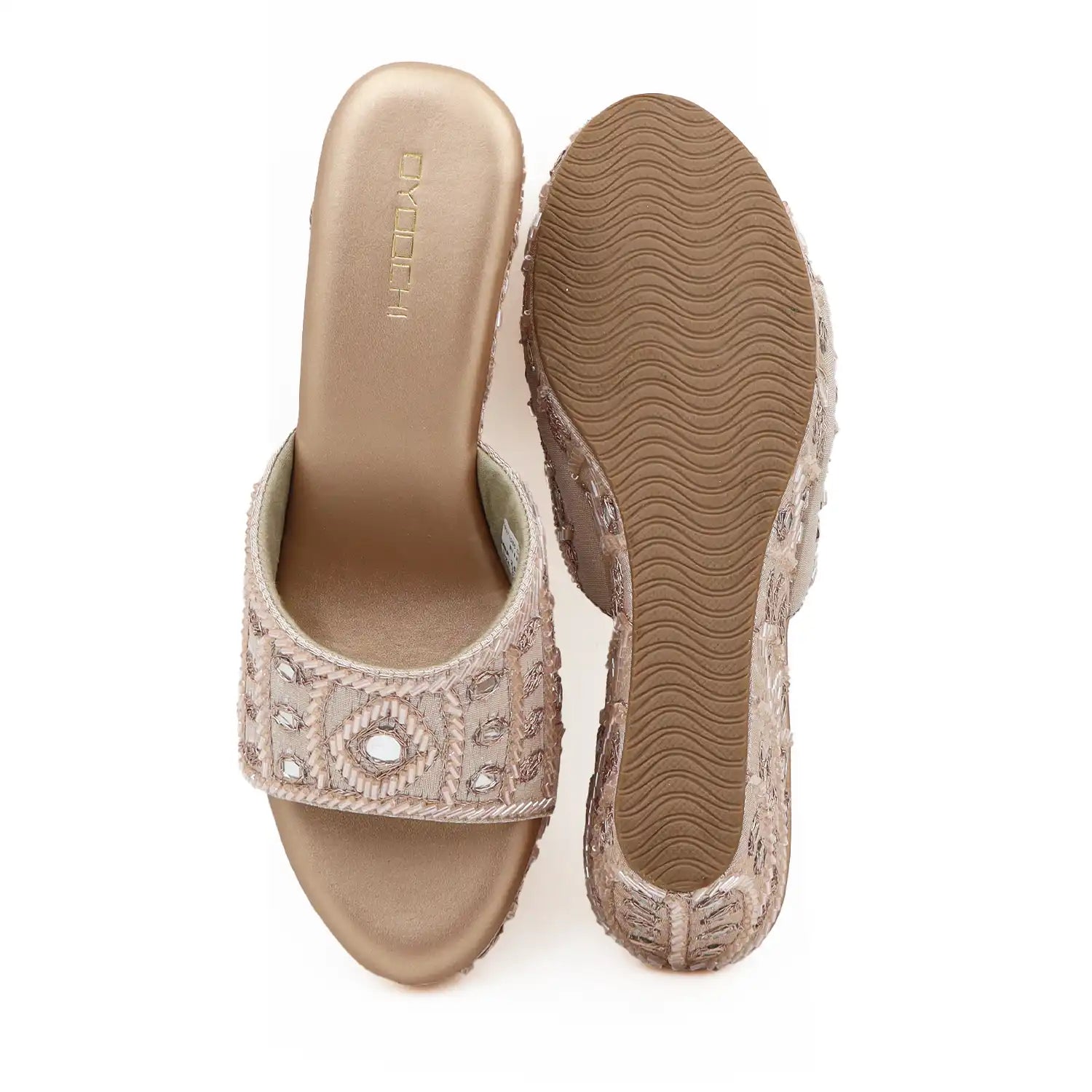 Sole and top view of women's ethnic rose gold wedge sandals