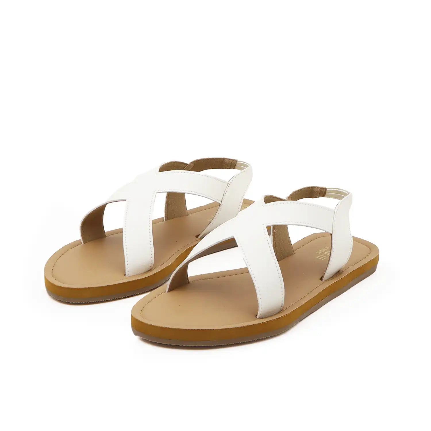 Women's white criss-cross flat sandals with a brown sole, pair view