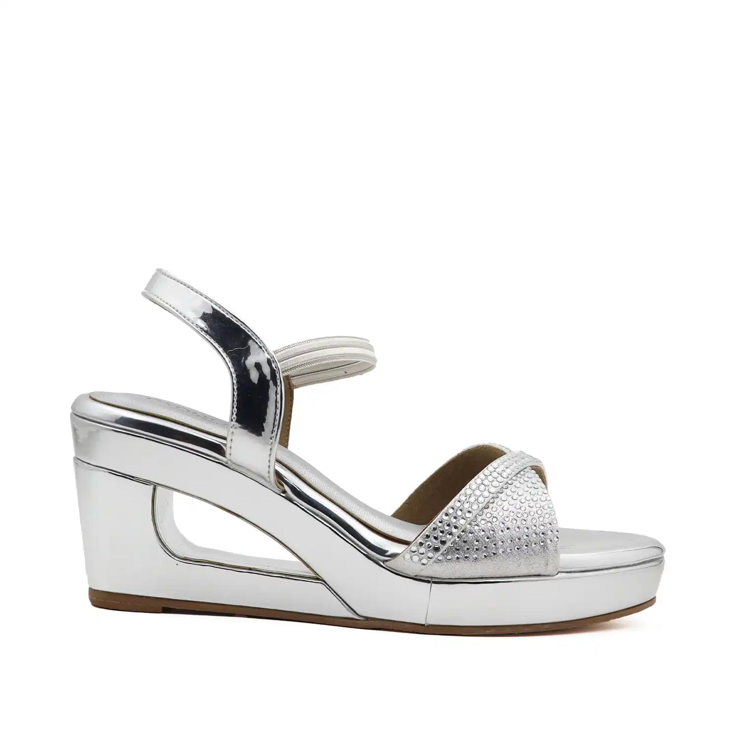 Women's 3 inch wedge heel comfortable silver embellished sandal, angled view