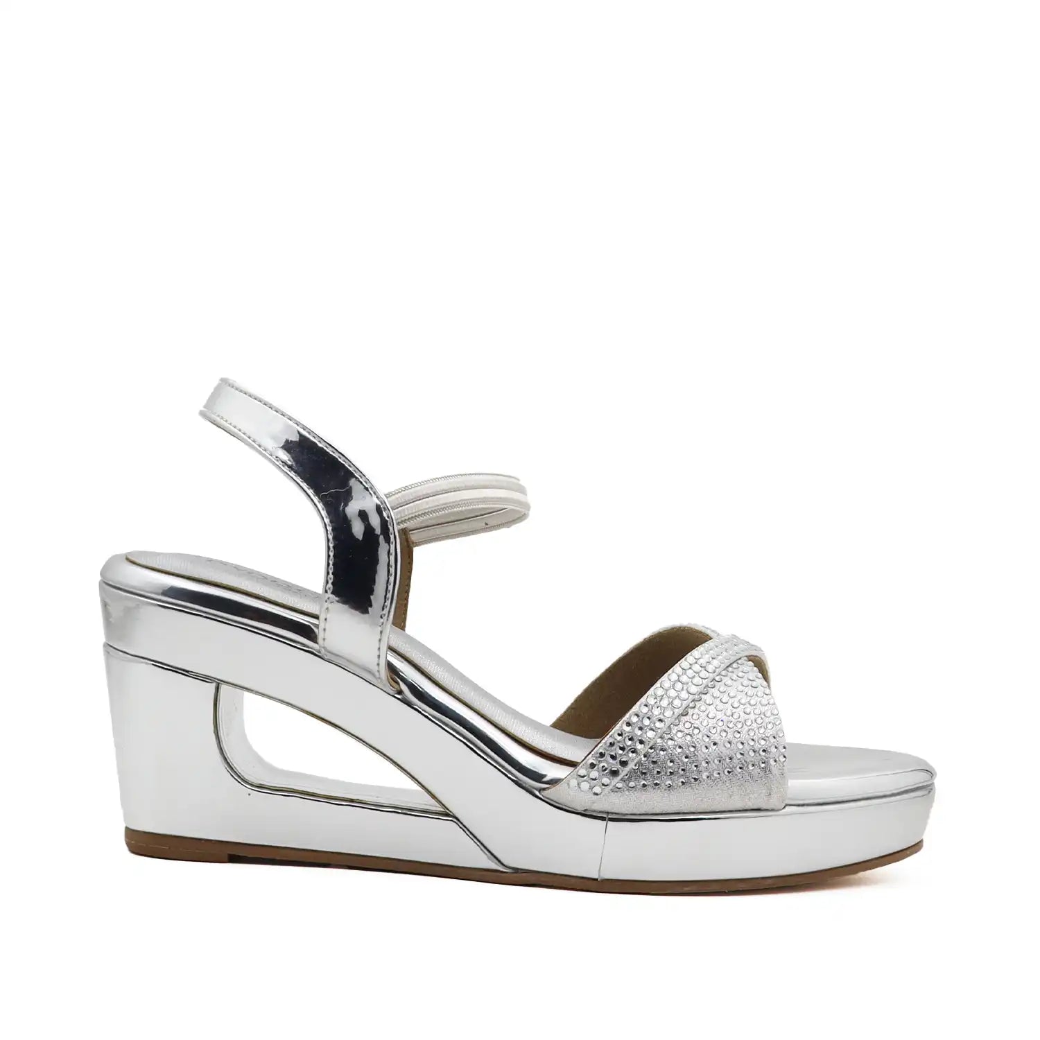 Women's 3 inch wedge heel comfortable silver embellished sandal, angled view
