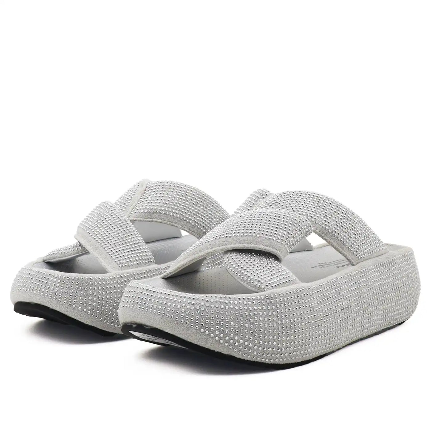 A pair of women's platform slide sandals embellished with sparkling rhinestones