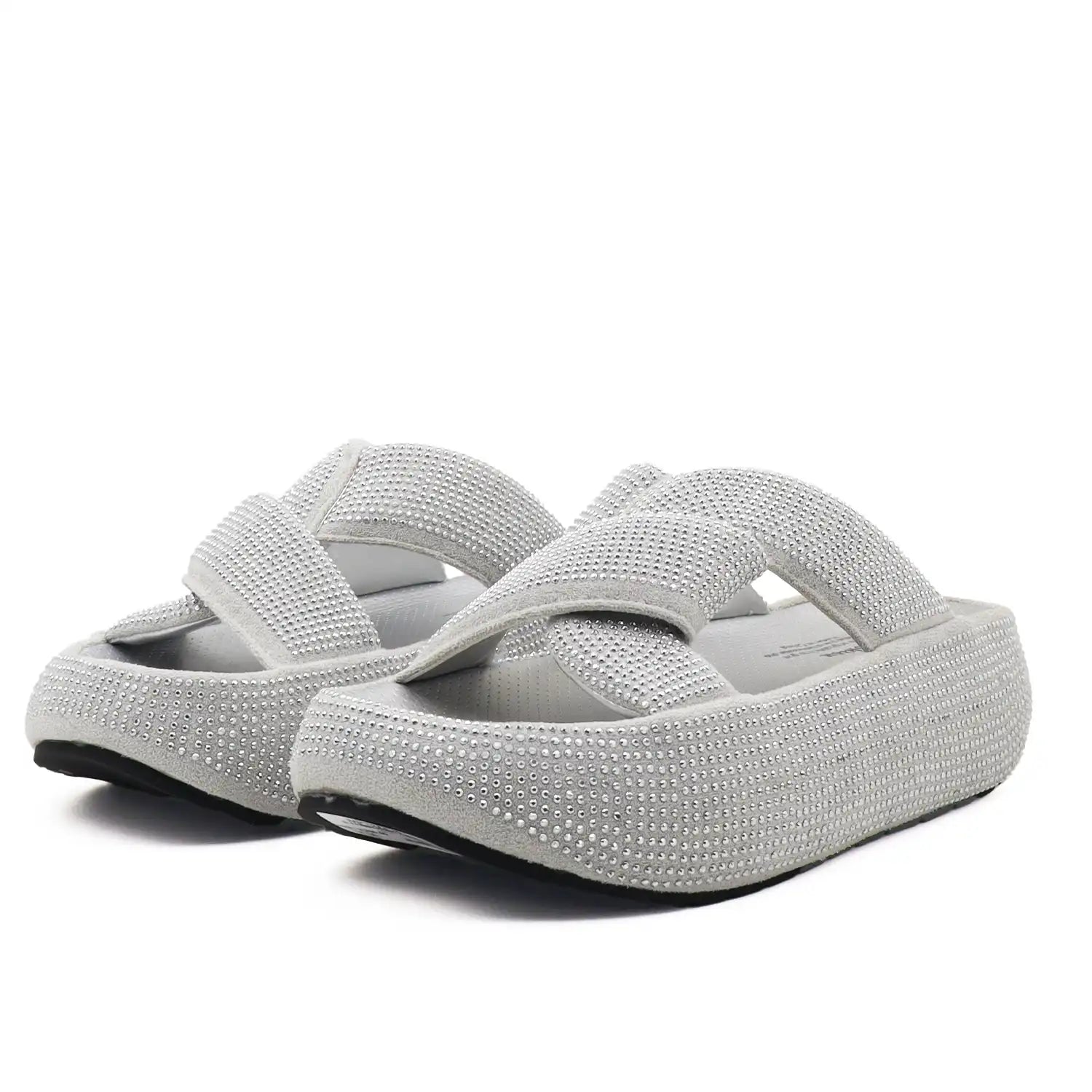 A pair of women's platform slide sandals embellished with sparkling rhinestones