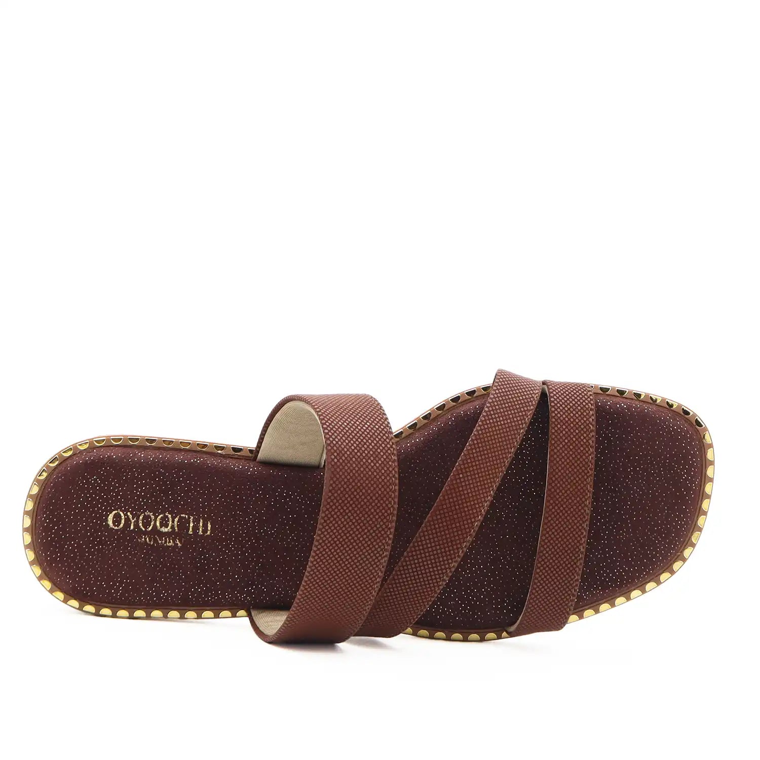 Top view of women;s flat brown sandals with  dr. recommended comfort in it