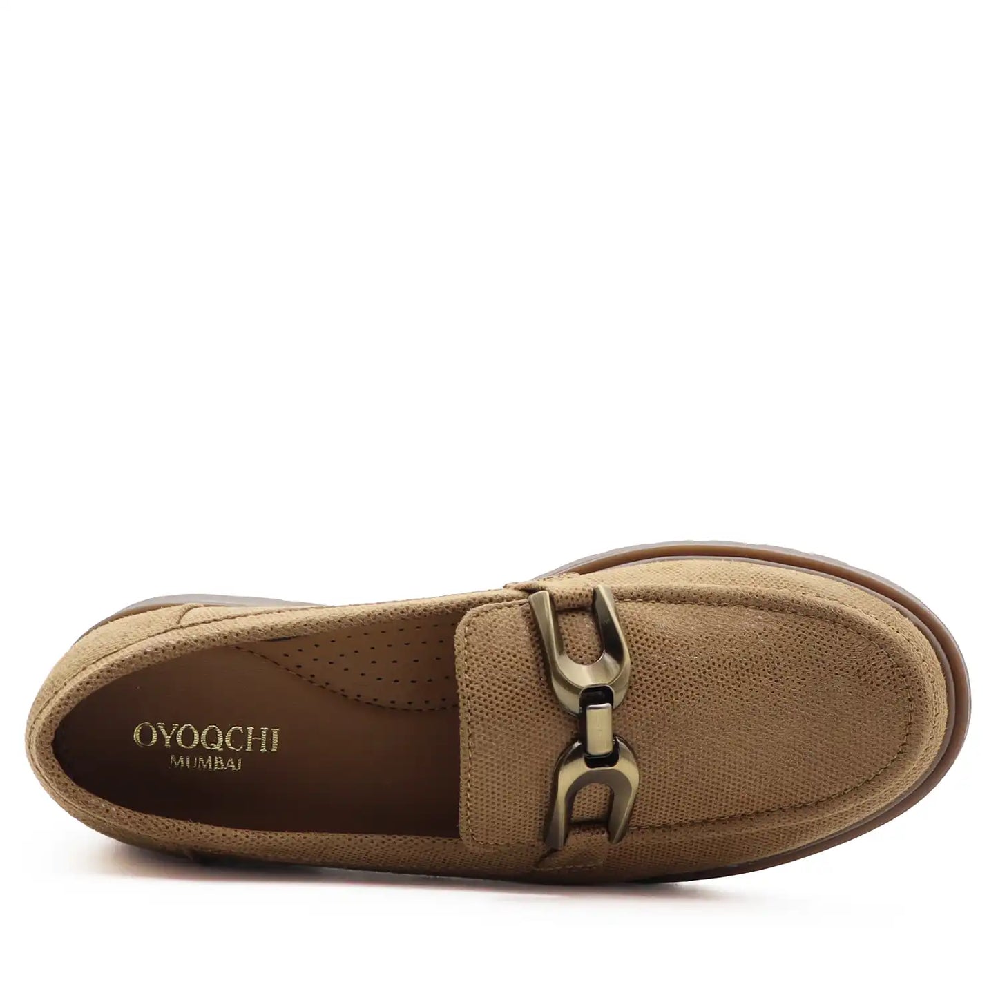 Tan loafer shoe with a metallic buckle on a white background
