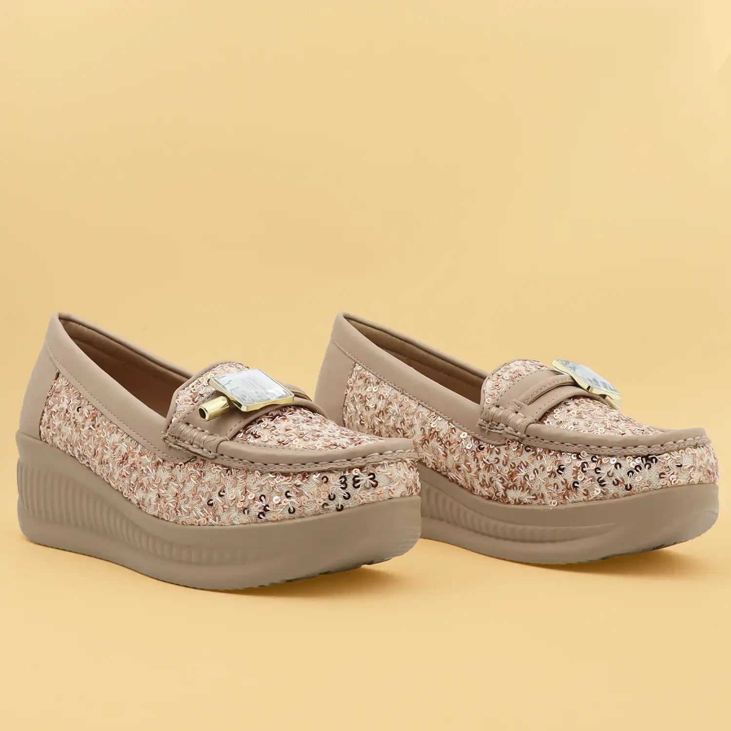 Women's 1.5 inch platform loafers with cushioned shoe bed in Rose gold, pair view