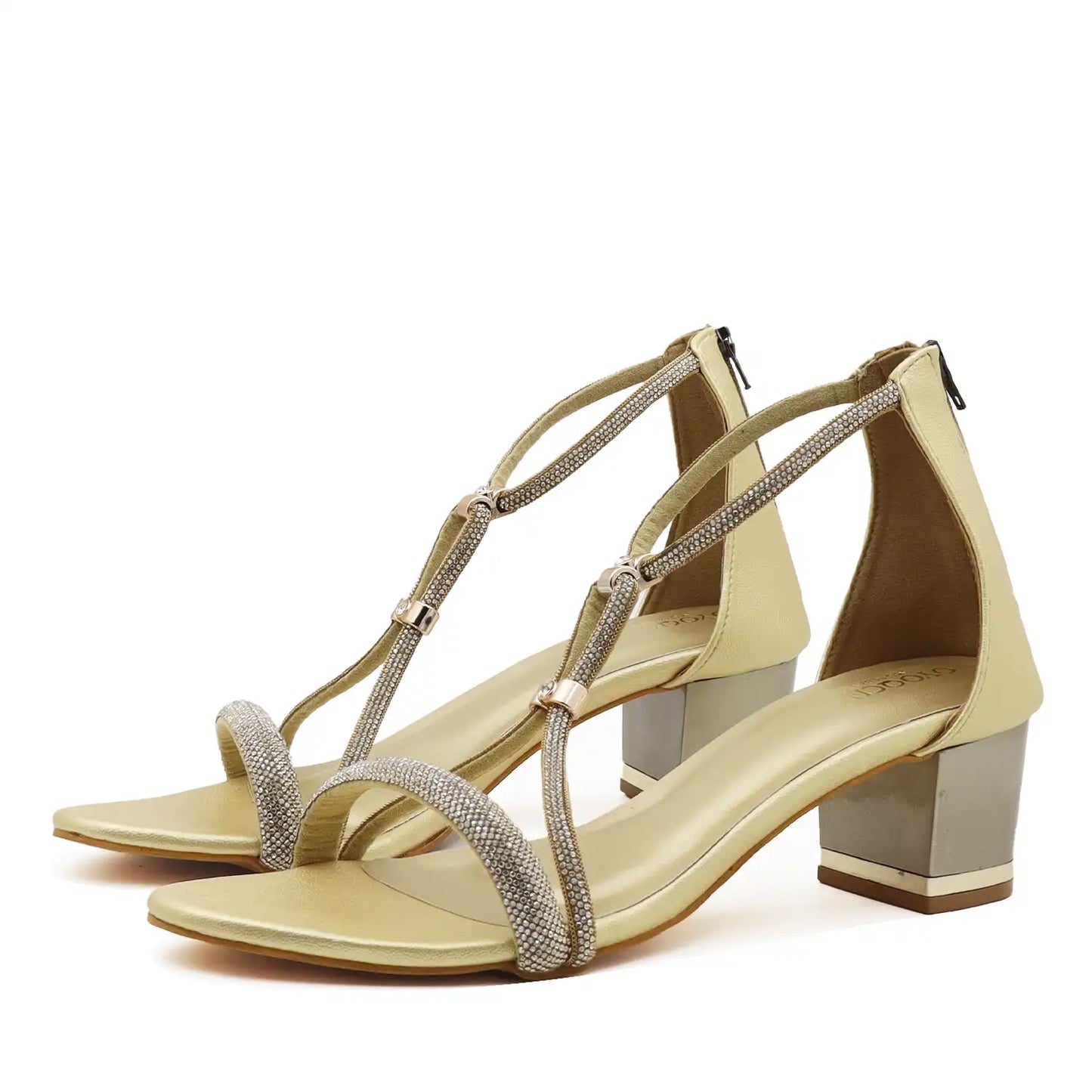 A pair of women's block-heel sandals in a champagne gold color, featuring sparkling silver rhinestone-embellished straps and a chunky metallic gold block heel.