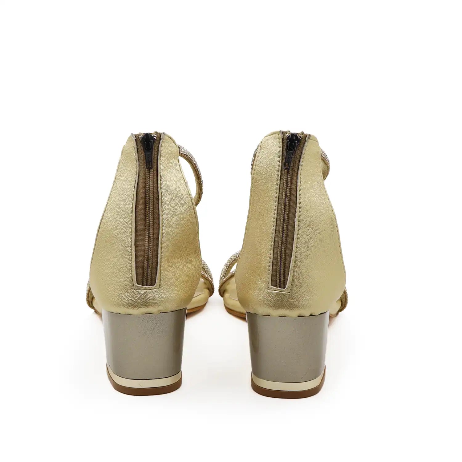 A pair of women's block-heel sandals shown from the back, featuring a metallic gold upper with a side zipper and a chunky metallic gold block heel
