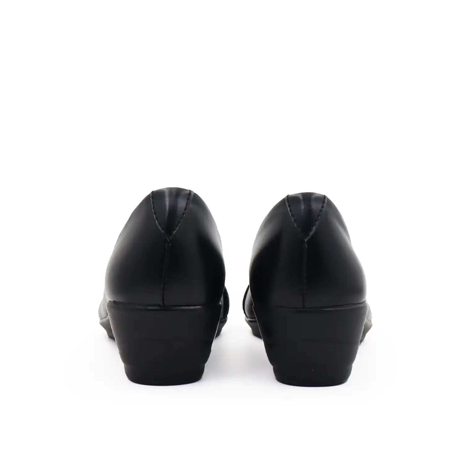 Women's black wedge shoe with a low block heel and comfortable shoe bed, heel view