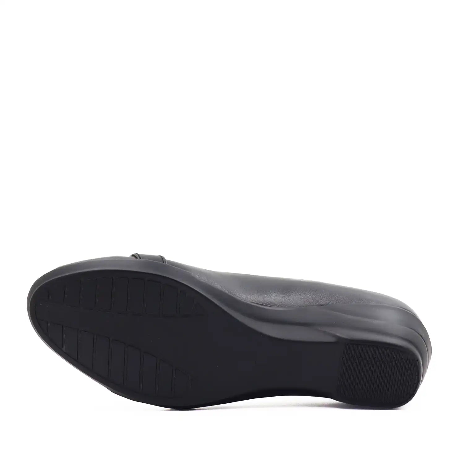 Women's black wedge shoe with a low block heel and comfortable shoe bed, sole view