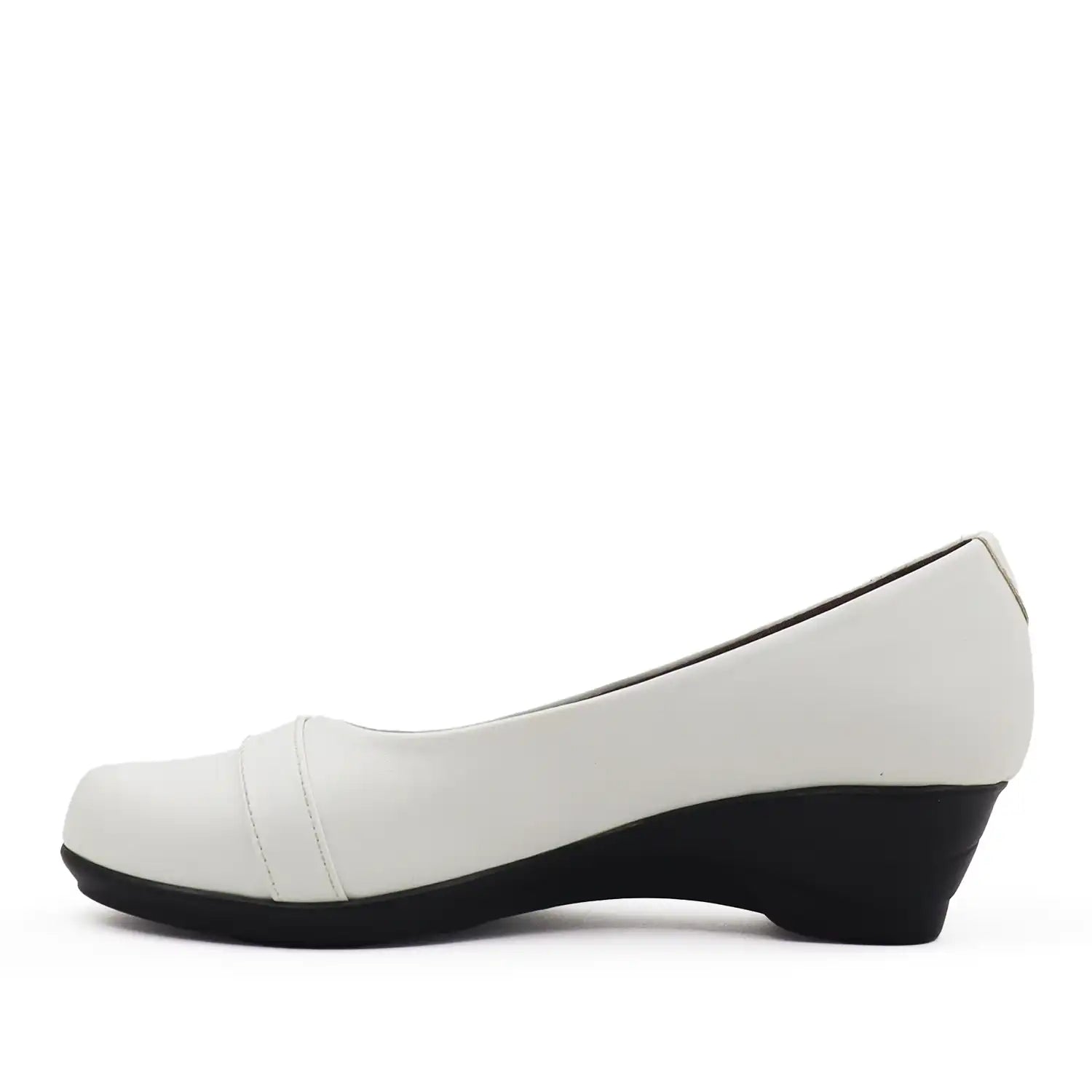 Women's white wedge shoe with a low block heel and comfortable shoe bed, side view