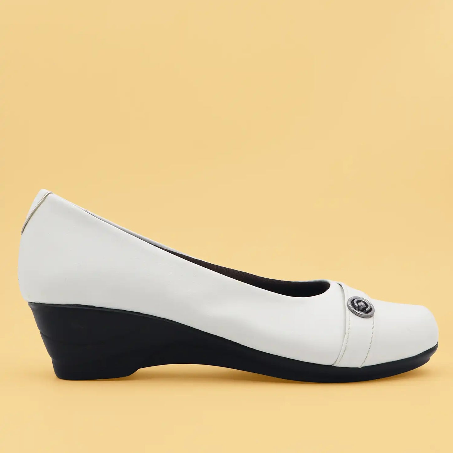 Women's white wedge shoe with a low block heel and comfortable shoe bed, side profile view