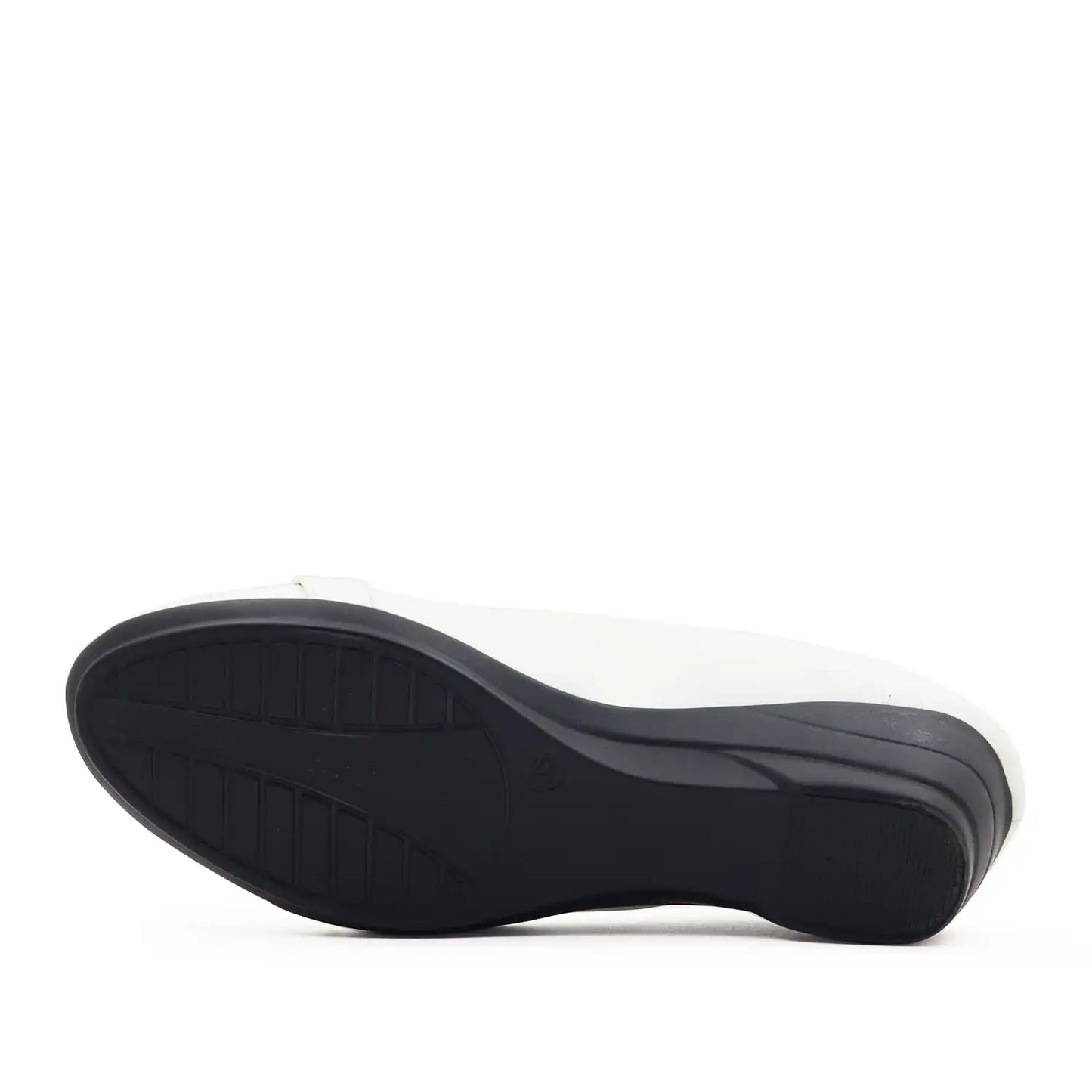Sole view of Women's white wedge shoe with a low block heel and comfortable shoe bed