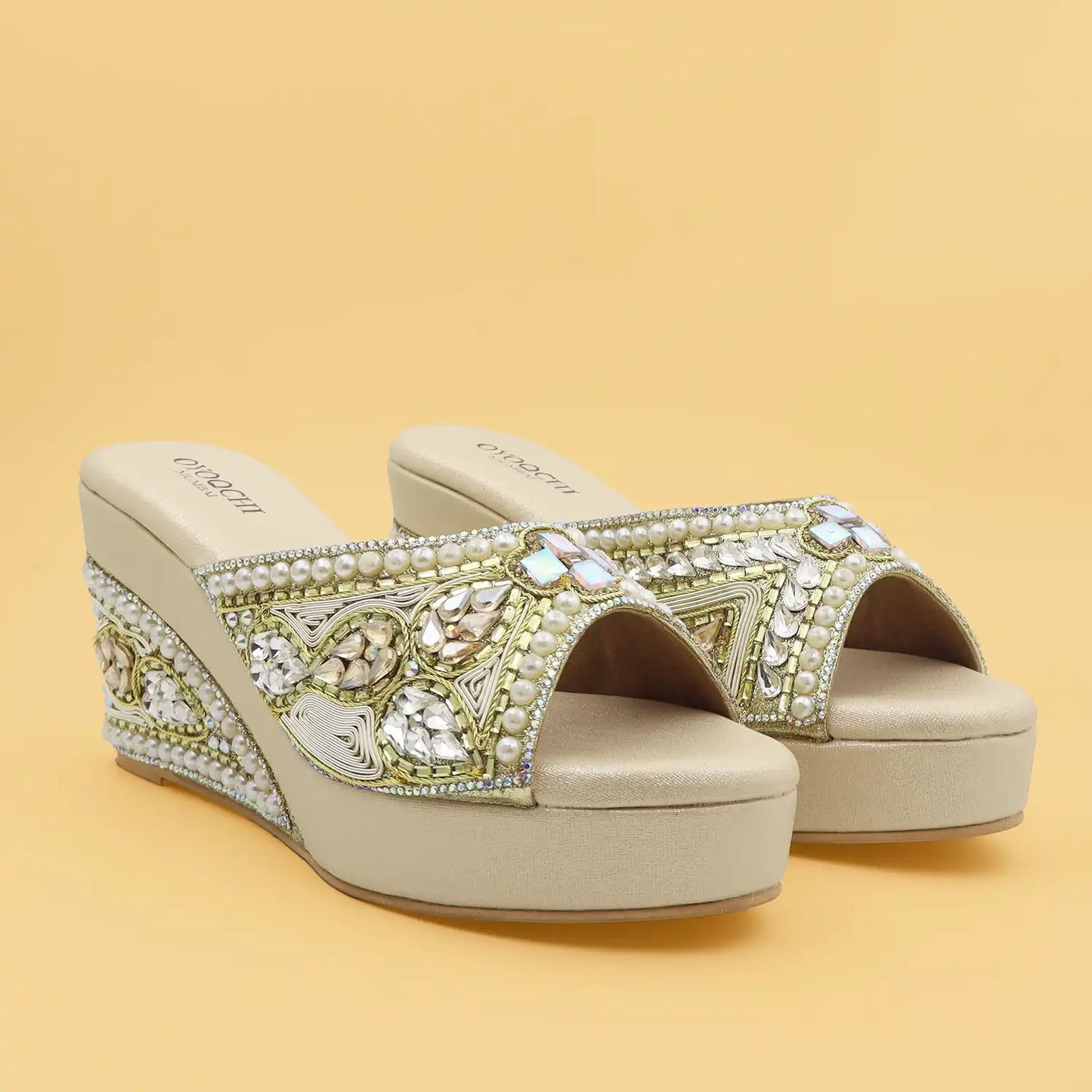 Women's Premium Ethnic gold Wedge Sandals with 3.5-inch heel, 1-inch platform and pearl embellishments, angled view